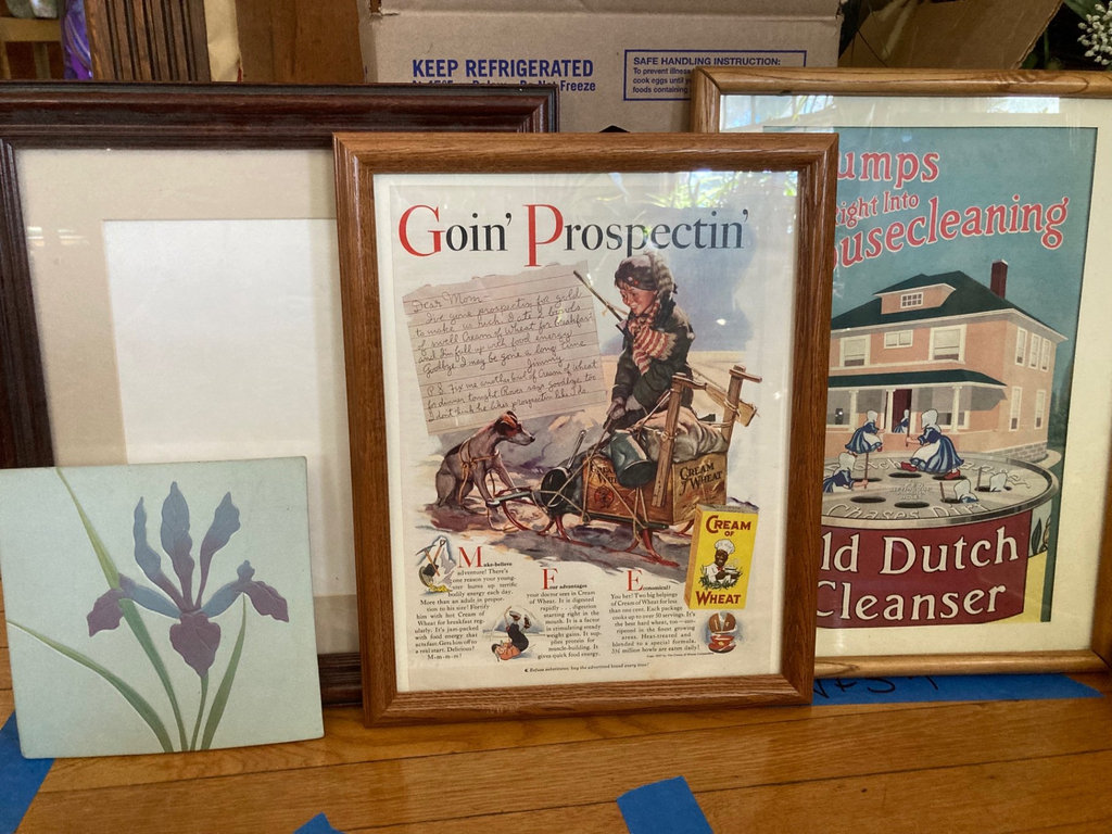 Framed vintage posters and ceramic tile - image 1 of 6