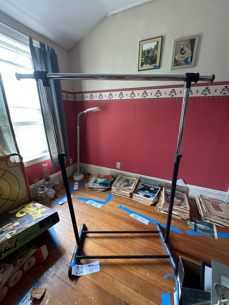 Metal and plastic garment rack  - image 1 of 3