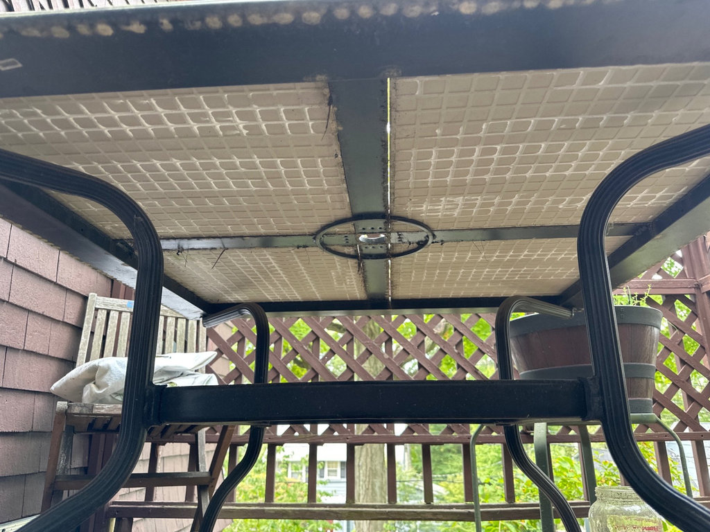 Outdoor black metal dining table with four-panel top - image 2 of 4