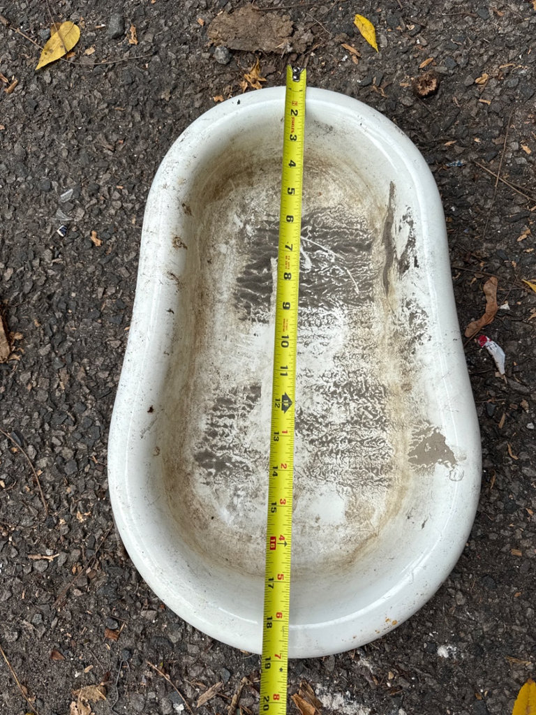 Weathered enamel infant tub basin on rusted folding stand - image 4 of 9