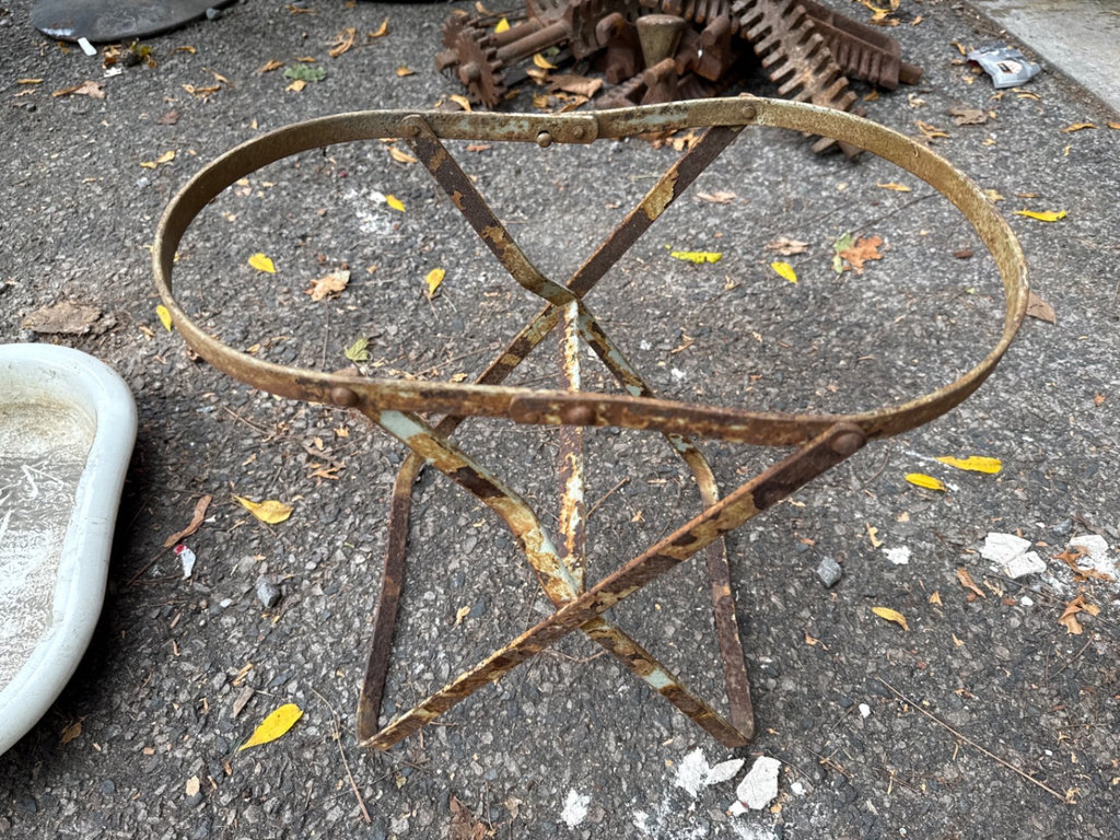 Weathered enamel infant tub basin on rusted folding stand - image 7 of 9