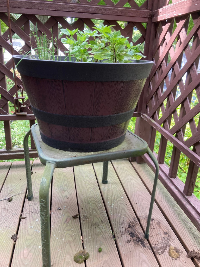 Large plastic planter and metal table - image 1 of 3