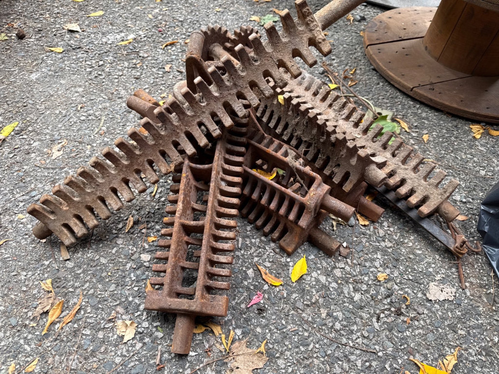Rusty antique farm harrow teeth and iron implements - image 2 of 5