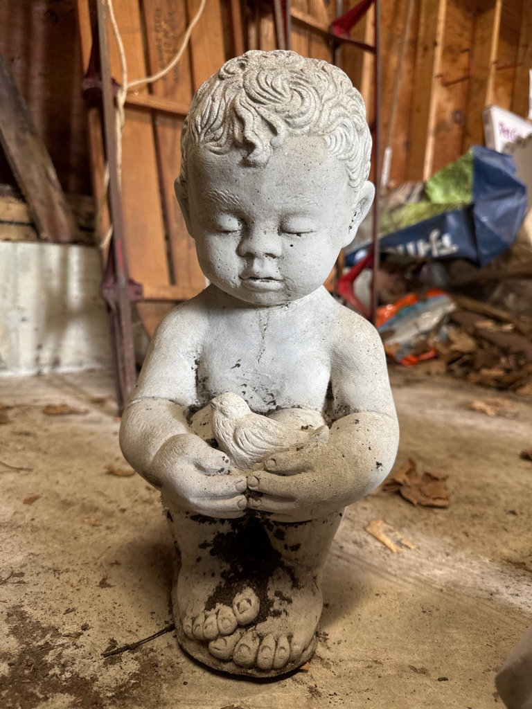 Concrete statue holding a bird - image 1 of 5