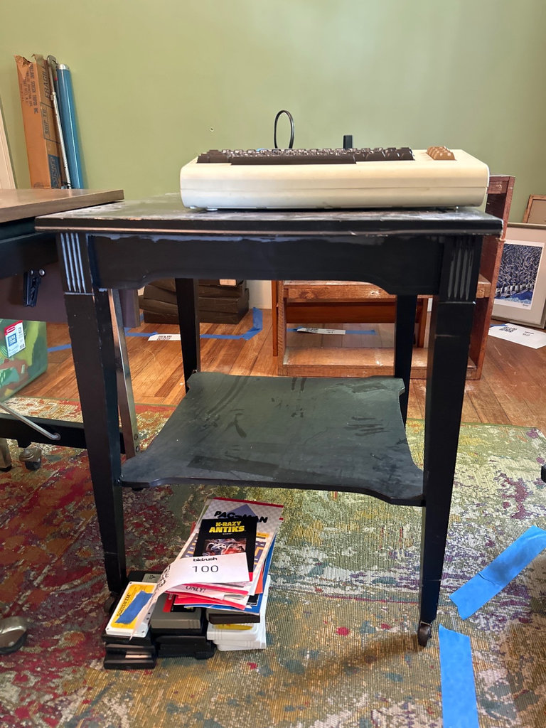 Wood Black side table on casters  - image 1 of 8