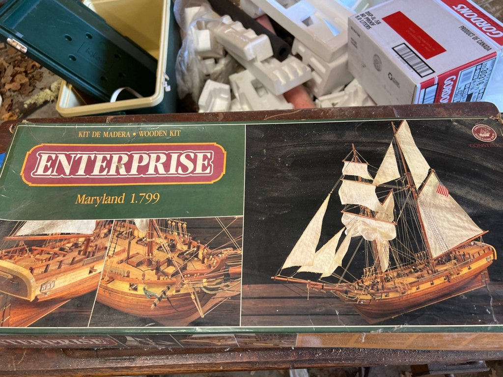 Wooden ship model kit with parts and instructions - image 1 of 4