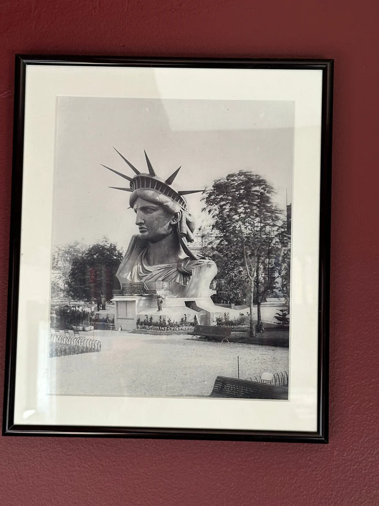 Framed photograph of Statue of Liberty Head on Display in Paris Park in 1883 - image 1 of 1