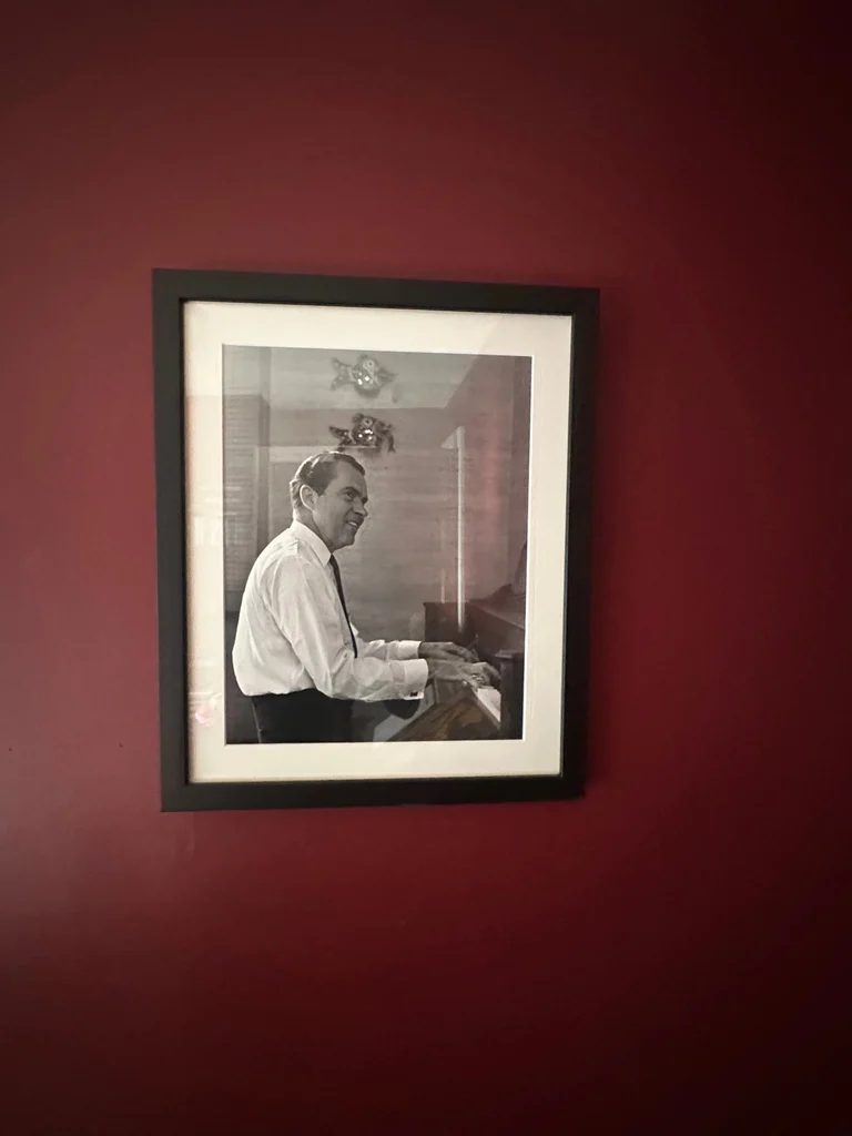 Framed Black and White Photograph of Richard Nixon playing the piano - image 2 of 2