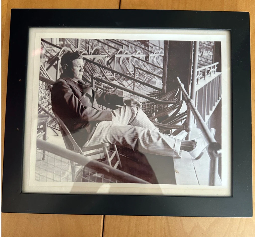 Black and White Photograph of Clark Gable reclining in a chair - image 1 of 2