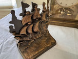 Antique mantel clock, lantern lamp, engraved tray, ship sculpture, angel candlesticks, and alcohol lamp bottle - thumbnail 3 of 8