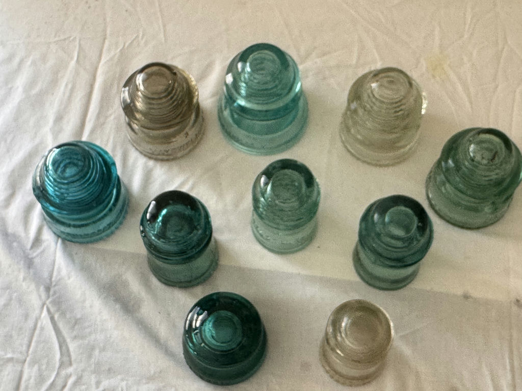Teal and clear glass insulator collection - image 3 of 6