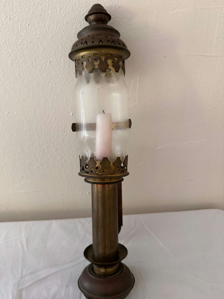 Antique mantel clock, lantern lamp, engraved tray, ship sculpture, angel candlesticks, and alcohol lamp bottle - image 6 of 8