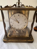 Antique mantel clock, lantern lamp, engraved tray, ship sculpture, angel candlesticks, and alcohol lamp bottle - thumbnail 4 of 8