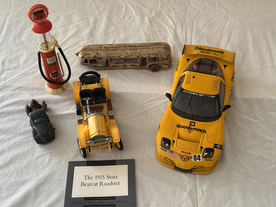 Assorted vintage die‑cast cars, bus model, gas pump, and certificate - Image 1 of 12