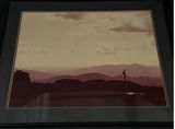 Framed landscape photograph with lone figure - thumbnail 1 of 4