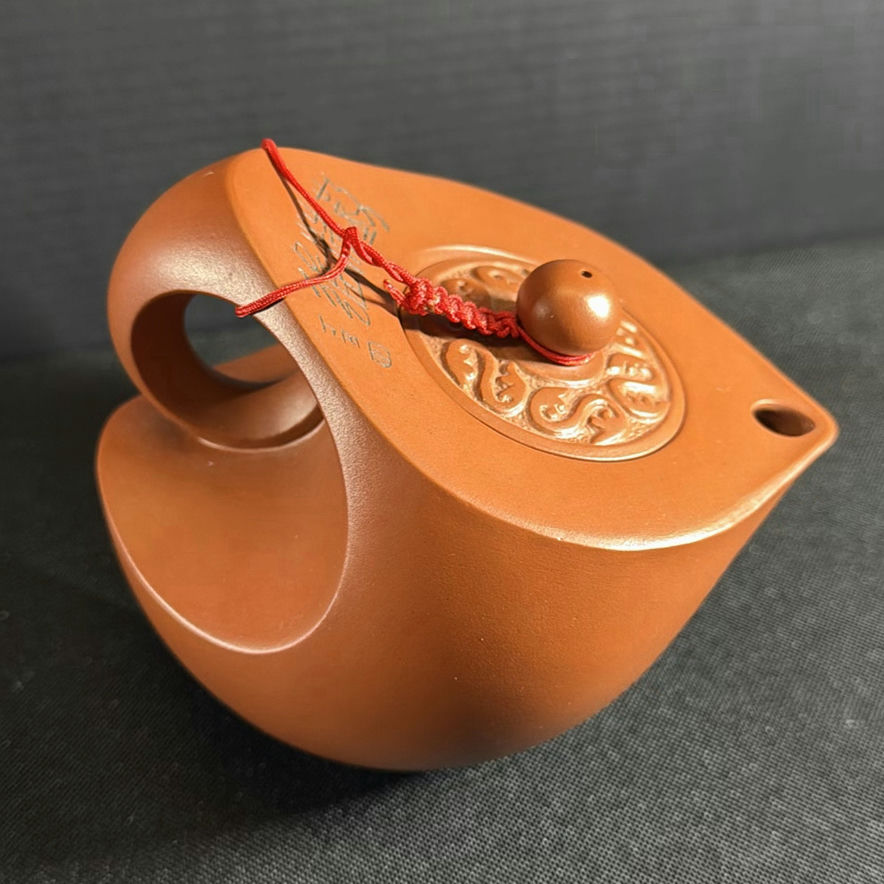 Yixing-style brown teapot with two cups and yellow box - image 4 of 4