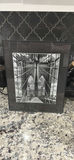 Framed Black-and-White Photograph of a Suspension Bridge Walkway - thumbnail 1 of 5