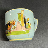Teal-blue glazed ceramic tea service with hand-painted figures and cactus motifs - thumbnail 7 of 12