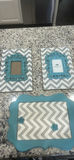 Teal ornate picture frames on chevron boards - thumbnail 1 of 6