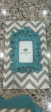 Teal ornate picture frames on chevron boards - thumbnail 3 of 6