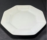 Ceramic pear-shaped figurine on white plate - thumbnail 2 of 5