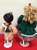 Two decorative dolls in traditional-style clothing - thumbnail 2 of 3