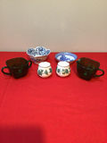 Blue-and-white porcelain bowls, salt-and-pepper shakers, and green glass mugs - thumbnail 1 of 4