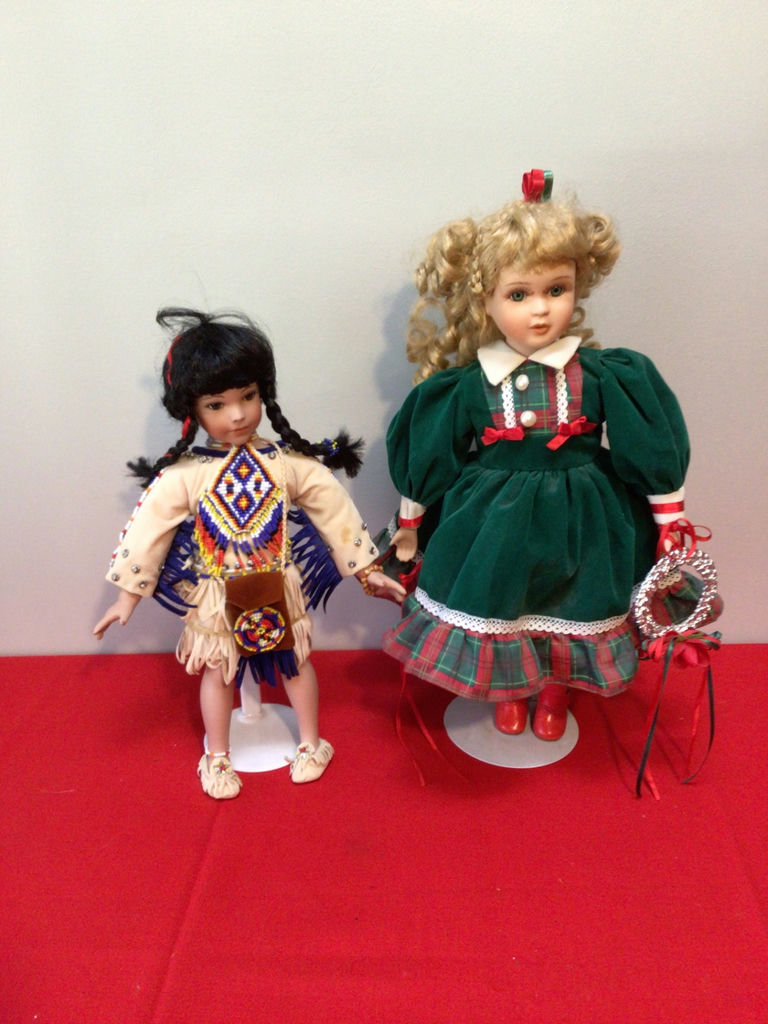 Two decorative dolls in traditional-style clothing - image 1 of 3