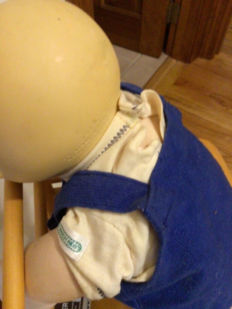 Wooden high chair with a doll - image 2 of 2