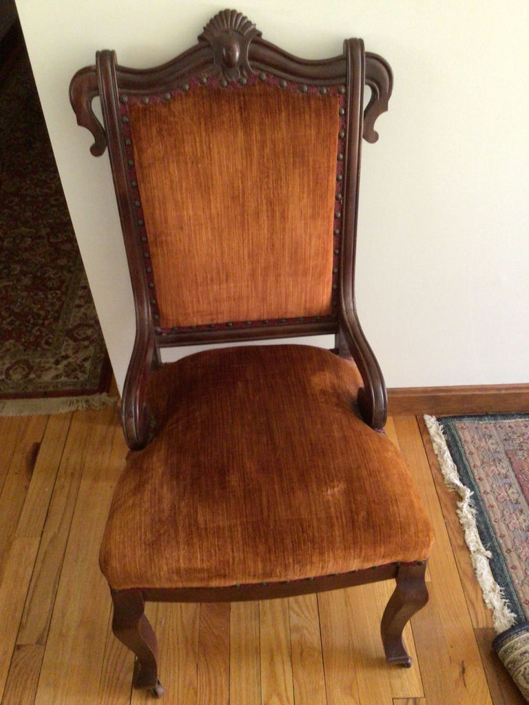 Carved wooden armchair with orange velvet upholstery - image 1 of 4