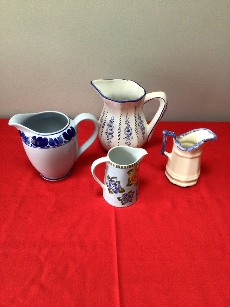 Assorted ceramic pitchers and a floral mug - image 2 of 3