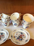 Floral-patterned teacups with matching plates - thumbnail 2 of 2
