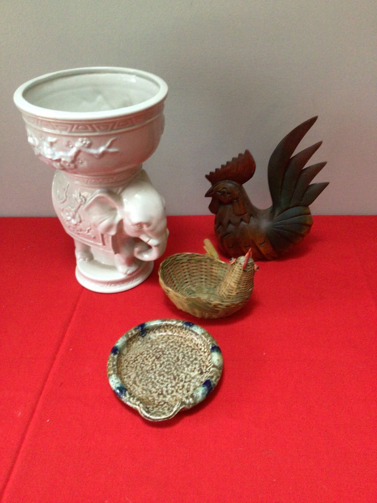 Decorative ceramic planter with floral relief, wooden rooster, wicker basket, and ceramic plate - image 1 of 2