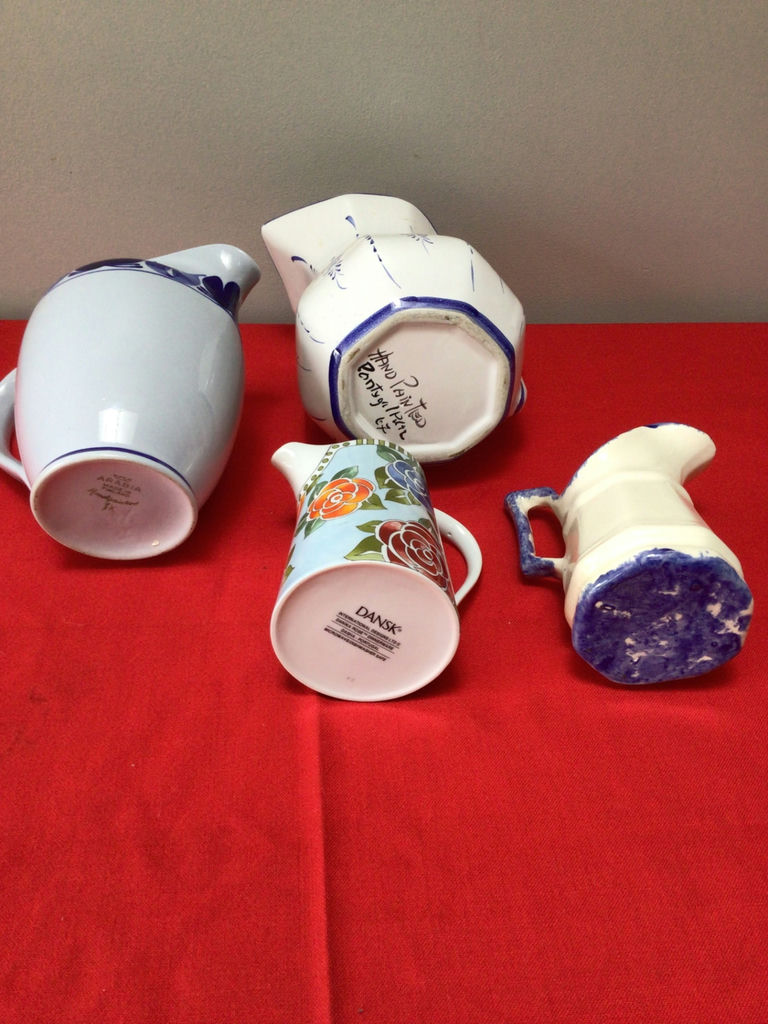 Assorted ceramic pitchers and a floral mug - image 3 of 3