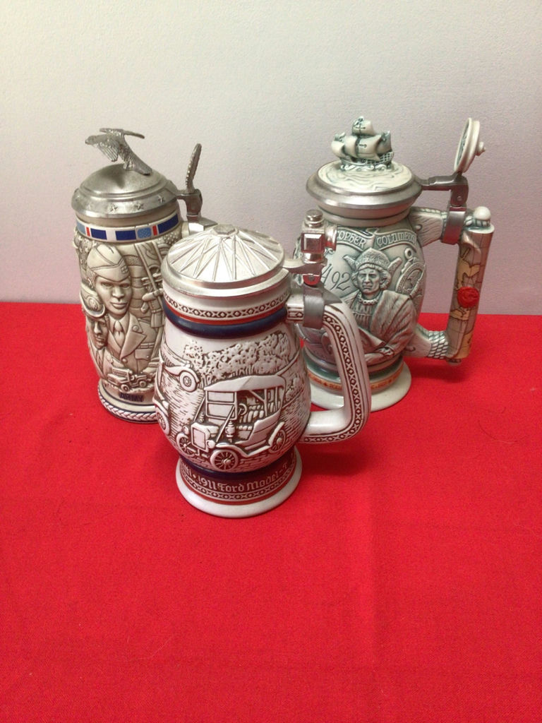 Collection of decorative beer steins with pewter lids - image 1 of 7