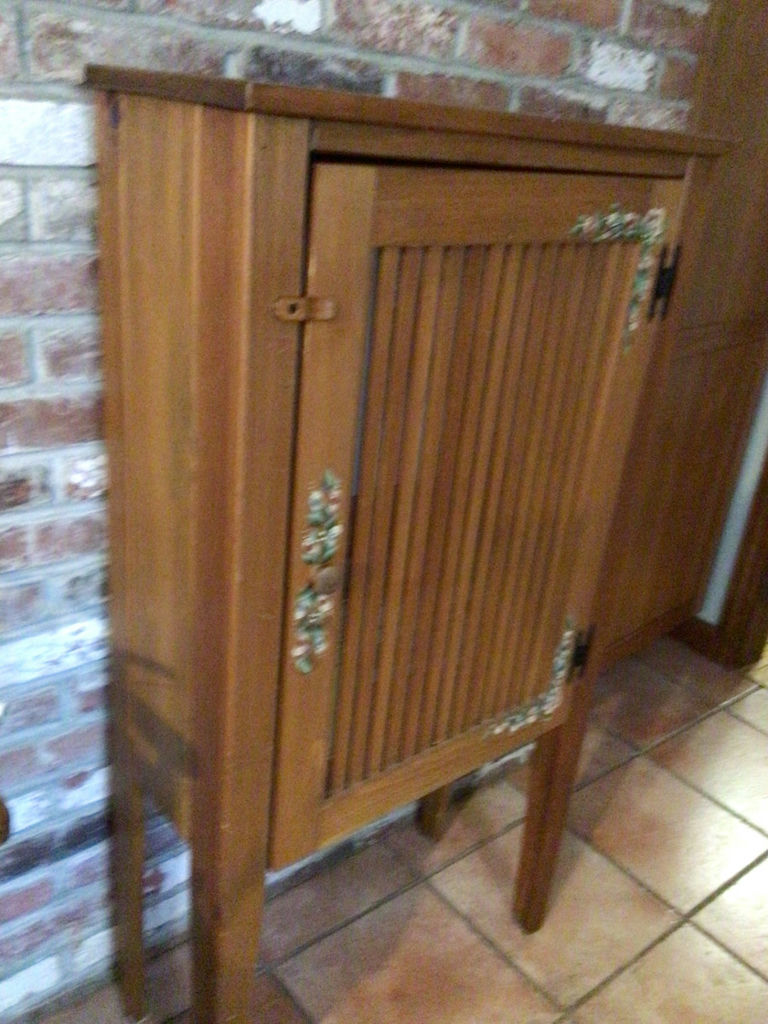 Wooden cabinet with slatted vent-style door - image 2 of 3