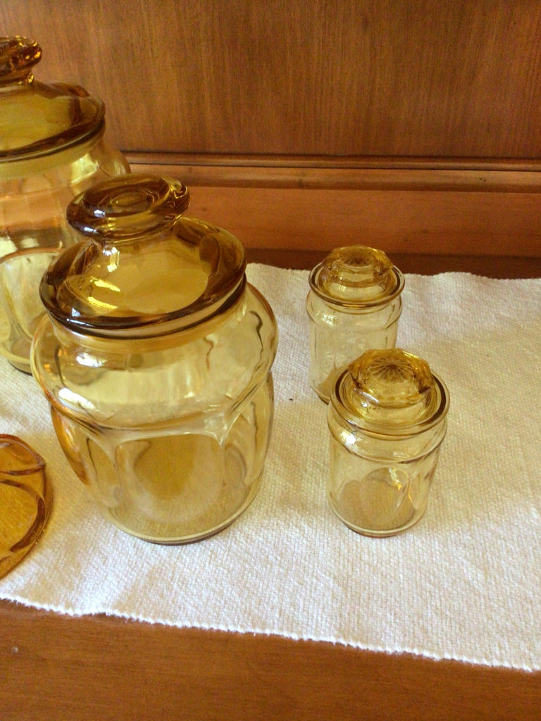 Amber glass jars with lids and candle holder - image 2 of 3