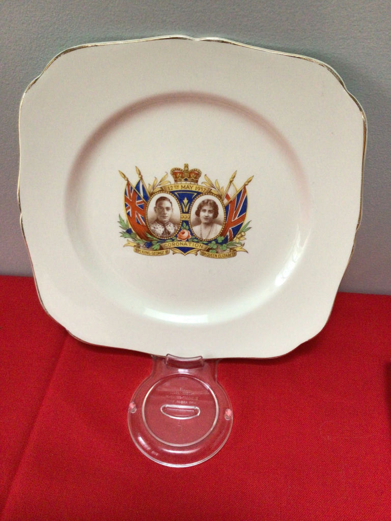 Decorative commemorative plate with crest and flags - image 1 of 4