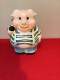 Ceramic pig figurine with striped shirt - thumbnail 1 of 3