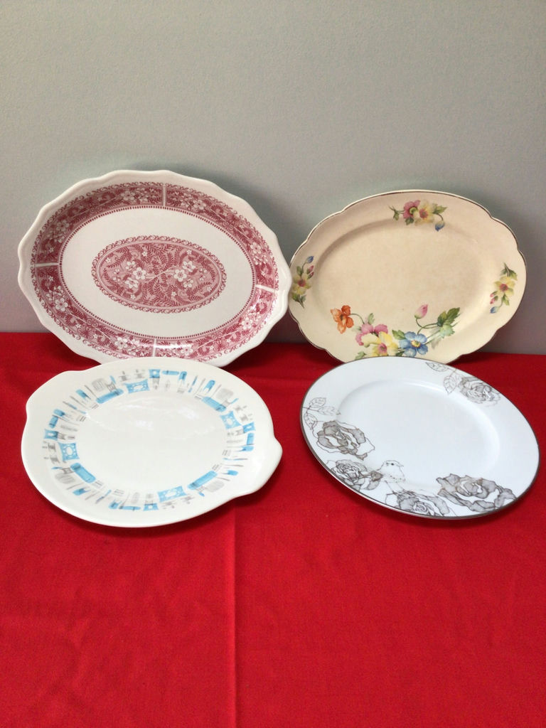 Set of four ceramic dinner plates with assorted patterns - image 1 of 3