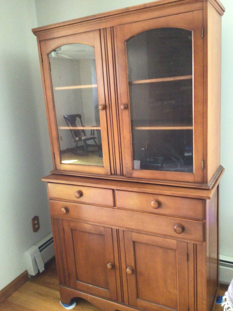 Wooden china cabinet with glass-front upper section and lower storage - image 2 of 3
