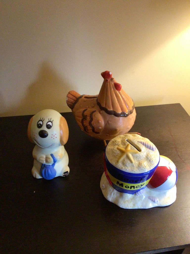 Ceramic dog, chicken, and sandcastle coin bank figurines - image 1 of 2