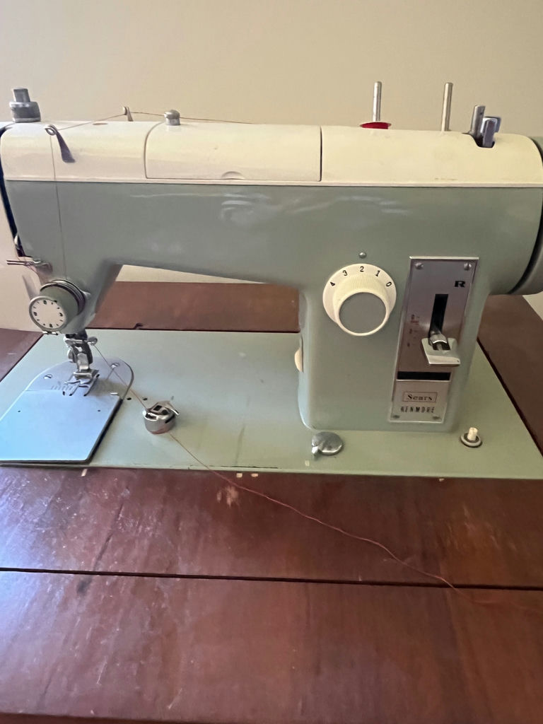 Vintage sewing machine on wooden table  - Sears Kenmore - image 2 of 2