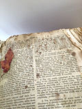Open antique dictionary with pressed leaf and handwritten inscription - thumbnail 1 of 4