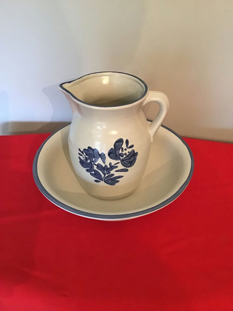 Ceramic pitcher with matching plate - image 1 of 3