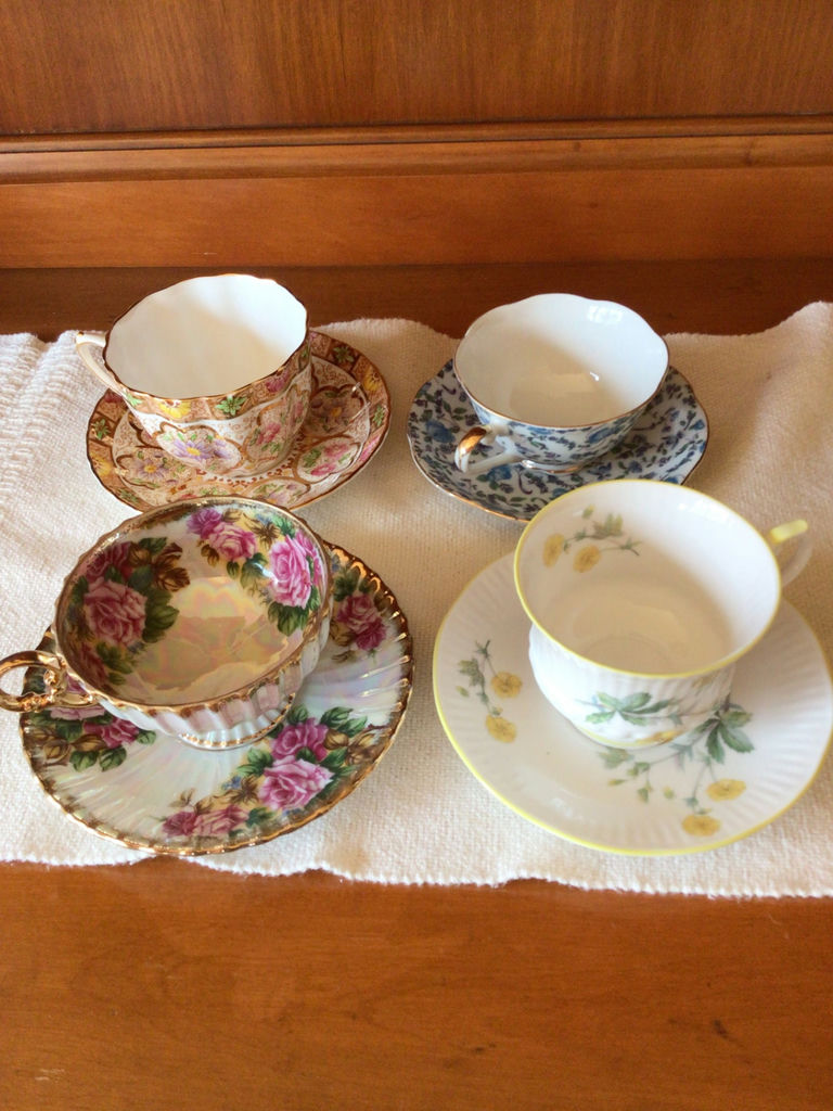 Floral china teacup and saucer set - image 1 of 6