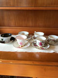 Floral bone china teacups and saucers with gold trim - thumbnail 1 of 7