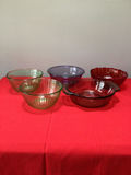 Set of Pyrex glass bowls and red casserole dish - thumbnail 1 of 5