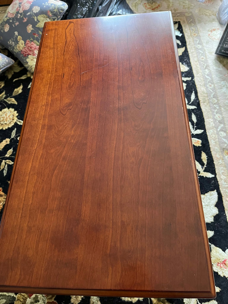 Rectangular wooden coffee table with carved legs - image 1 of 2