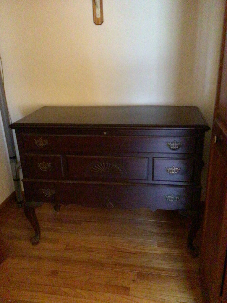 Dark wood dresser with brass hardware - image 1 of 3